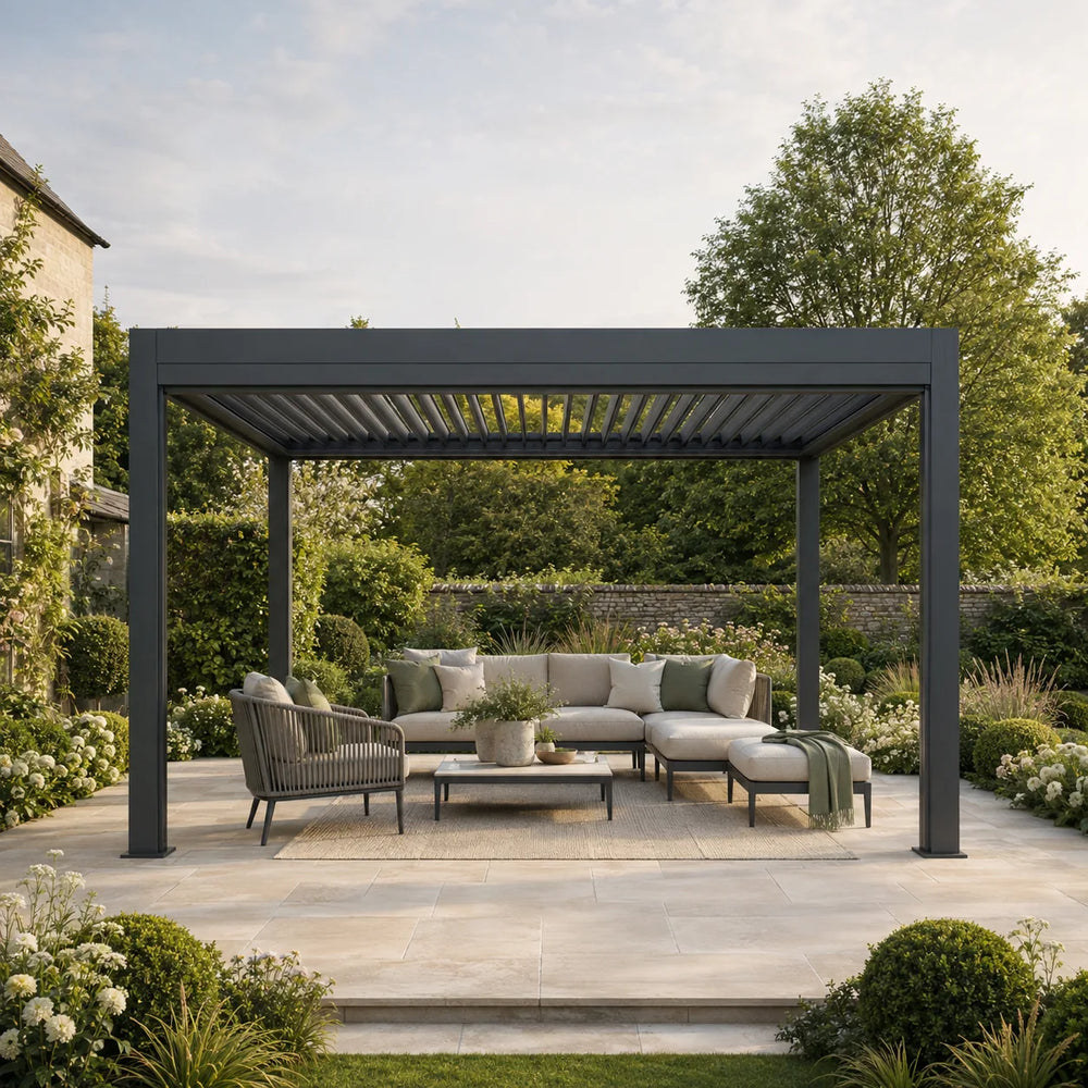 Contemporary dark grey louvred pergola with cream outdoor lounge furniture on a landscaped garden patio – Verdant Lounge UK