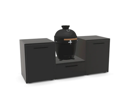 A black ceramic kamado grill with a light wood handle and silver lid latch, displayed on a black outdoor cooking island with two side cabinets against a white background.