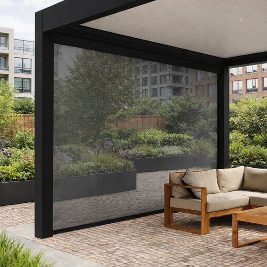 Black Pinela motorised side screen fitted to a contemporary aluminium pergola with outdoor seating.