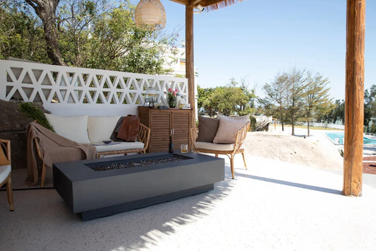 Positano Fire Table beside contemporary outdoor lounge furniture